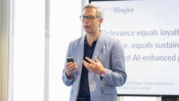 A speaker at the Newsrewired conference